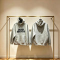 Deep Breath Hoodie in heather grey — front and back view